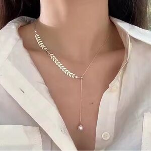 NWT Silver Tone Drop Pearl Necklace with side chevron design